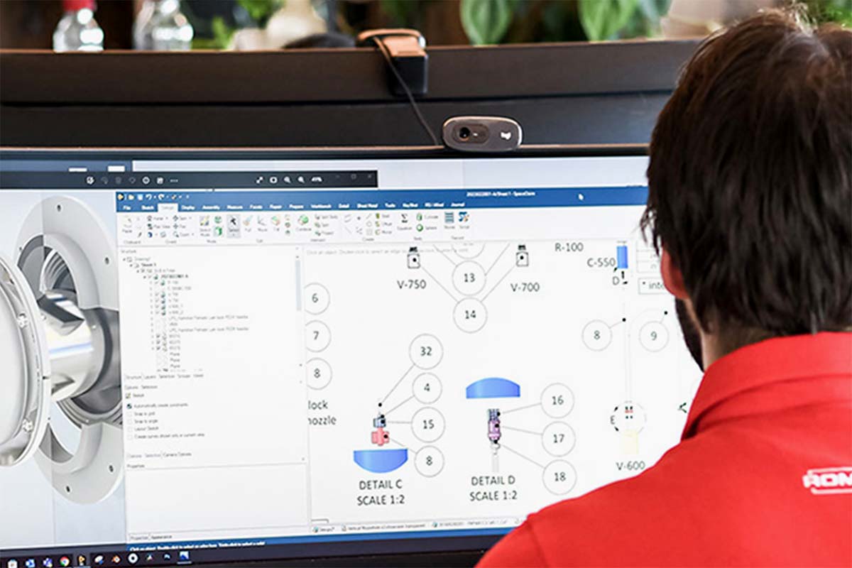 Romynox employee working on a 3D CAD drawing for custom high-purity equipment design.