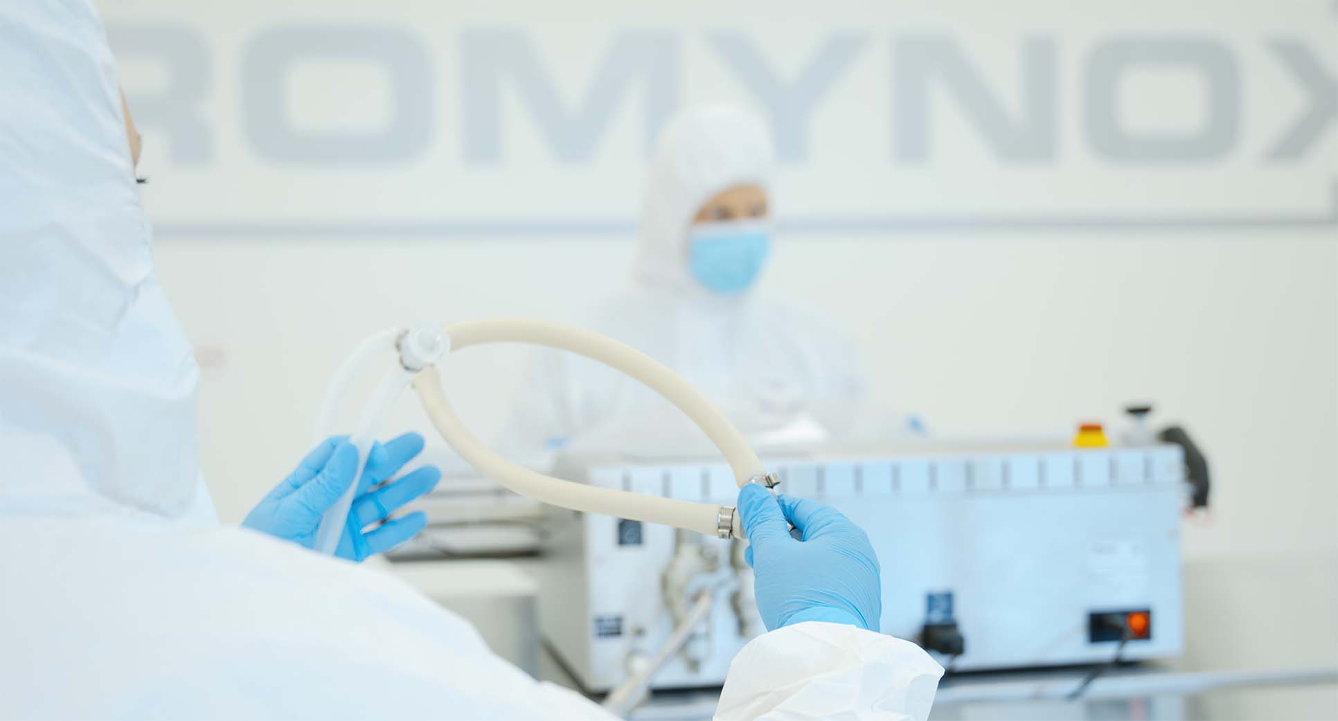 Romynox employees assembling components in the cleanroom.